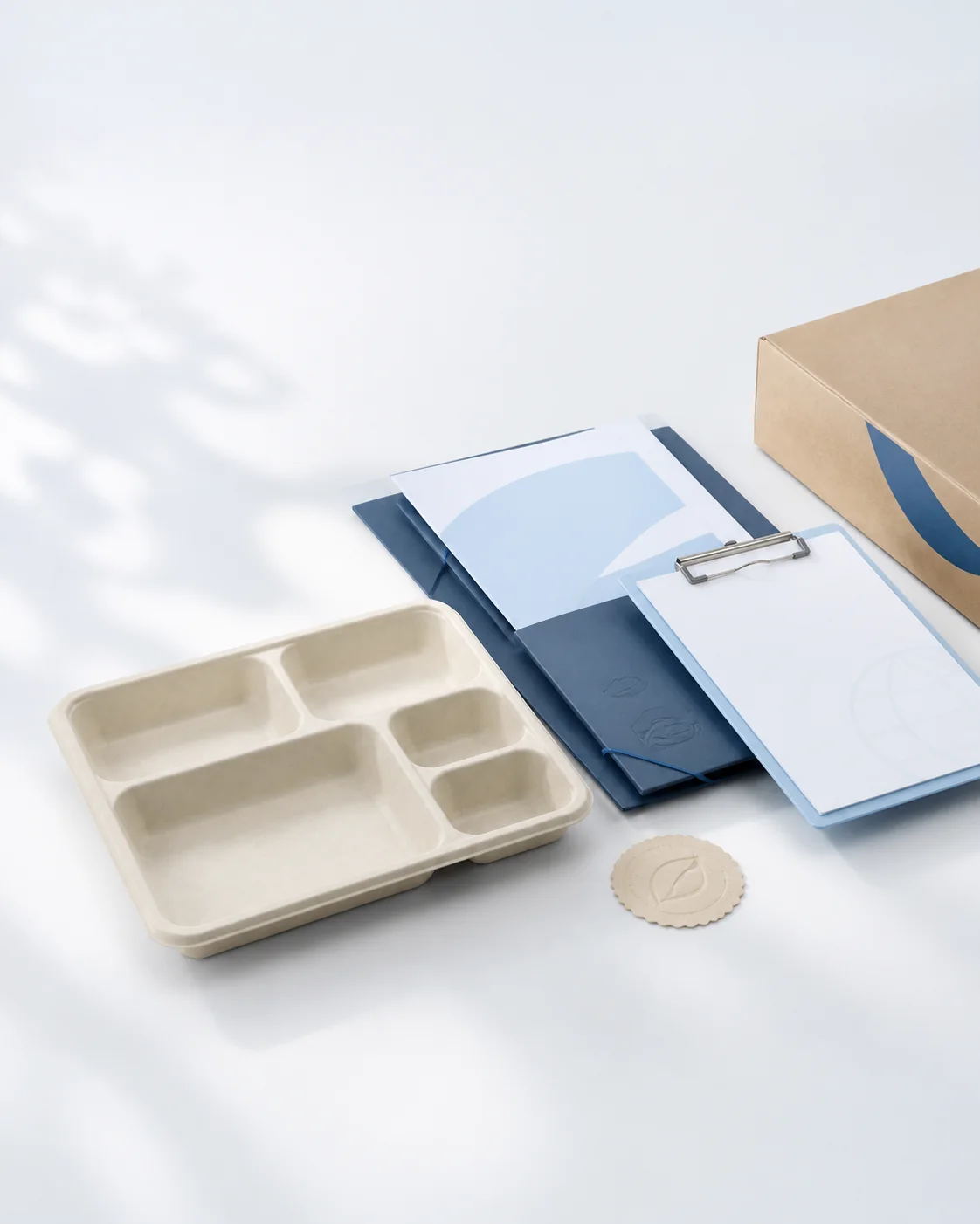 Paras fibre tray beside order and shipment documents