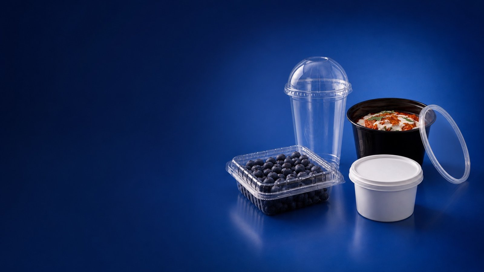 Paras food packaging formats arranged on a deep blue studio background
